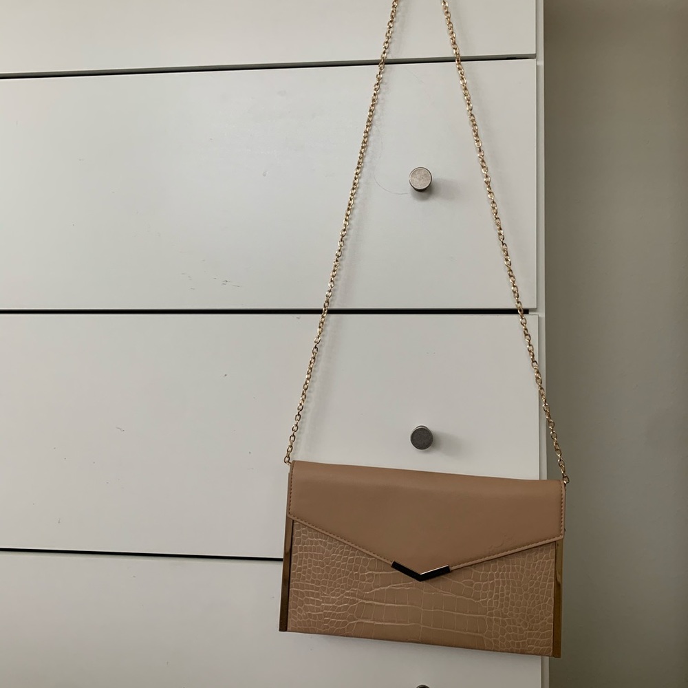 Urban expressions nude and gold clutch
